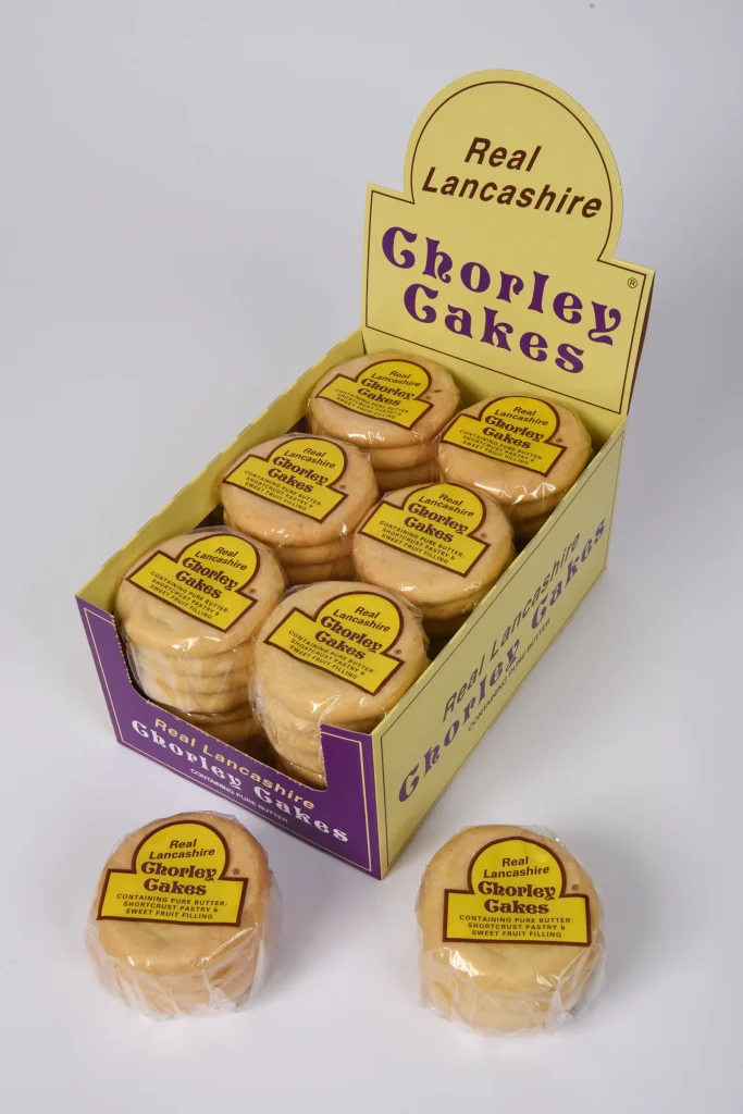 Display box of Real Lancashire Chorley Cakes 4-packs with two packs in front